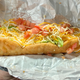Image for article titled Prepare to be satisfied, not wowed, by Taco Bell’s Flamin’ Hot Doritos Locos Tacos
